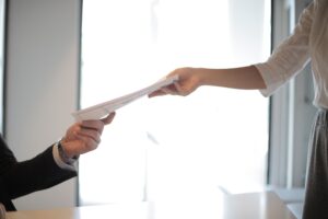 Business leader reviewing an employer of record service agreement